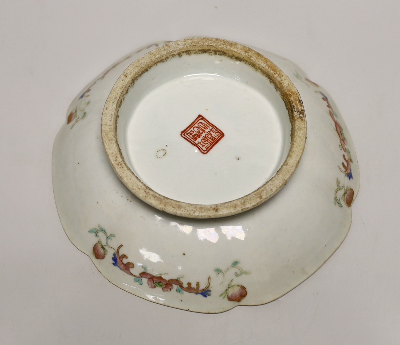 A set of Chinese famille rose bird or insect and flowers dishes, Tongzhi mark and period (1862-74), largest 23 cm wide